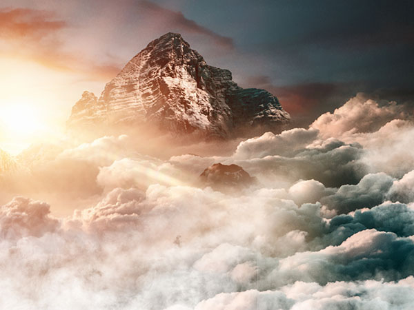 A primary image associated with God's presence is a cloud, whether dark or
